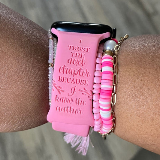 Pink I Trust the Author watch band for Apple Watch worn on a wrist with pink beaded bracelets