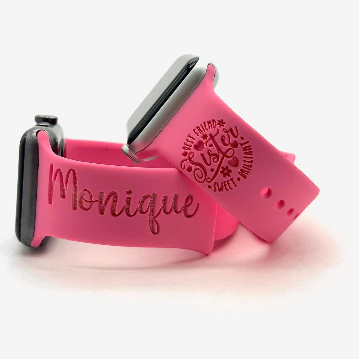 Pink Sister watch band for Apple Watch engraved with the Best Friend Sister design, shown with a band engraved with the name Monique