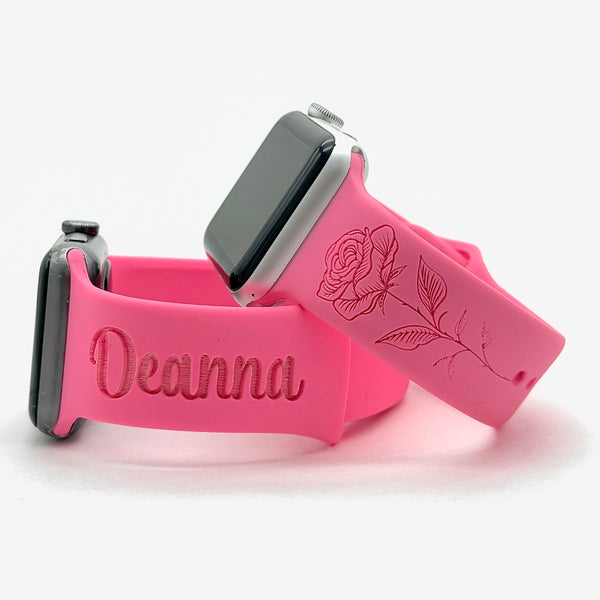 Pink Birth Month Flower watch band for Apple Watch engraved with the June Rose design, shown with a band engraved with the name Deanna