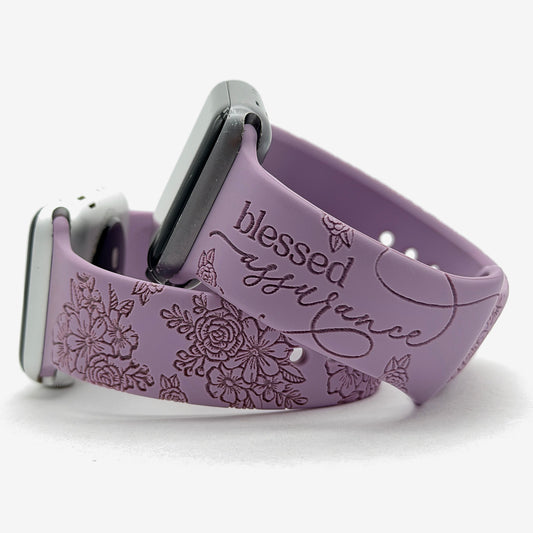 Lavender Blessed Assurance watch band for Apple Watch with script engraving, shown with a matching floral engraved band