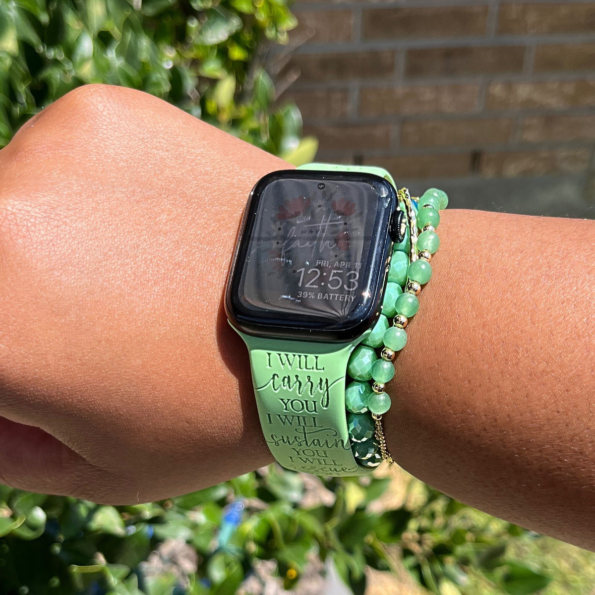 Green I Will Carry You watch band for Apple Watch worn outdoors, watch face view