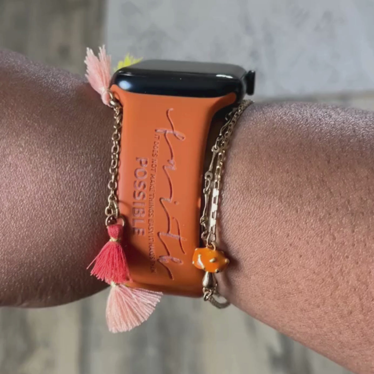 Rust Faith Makes It Possible watch band for Apple Watch worn on a wrist, side view