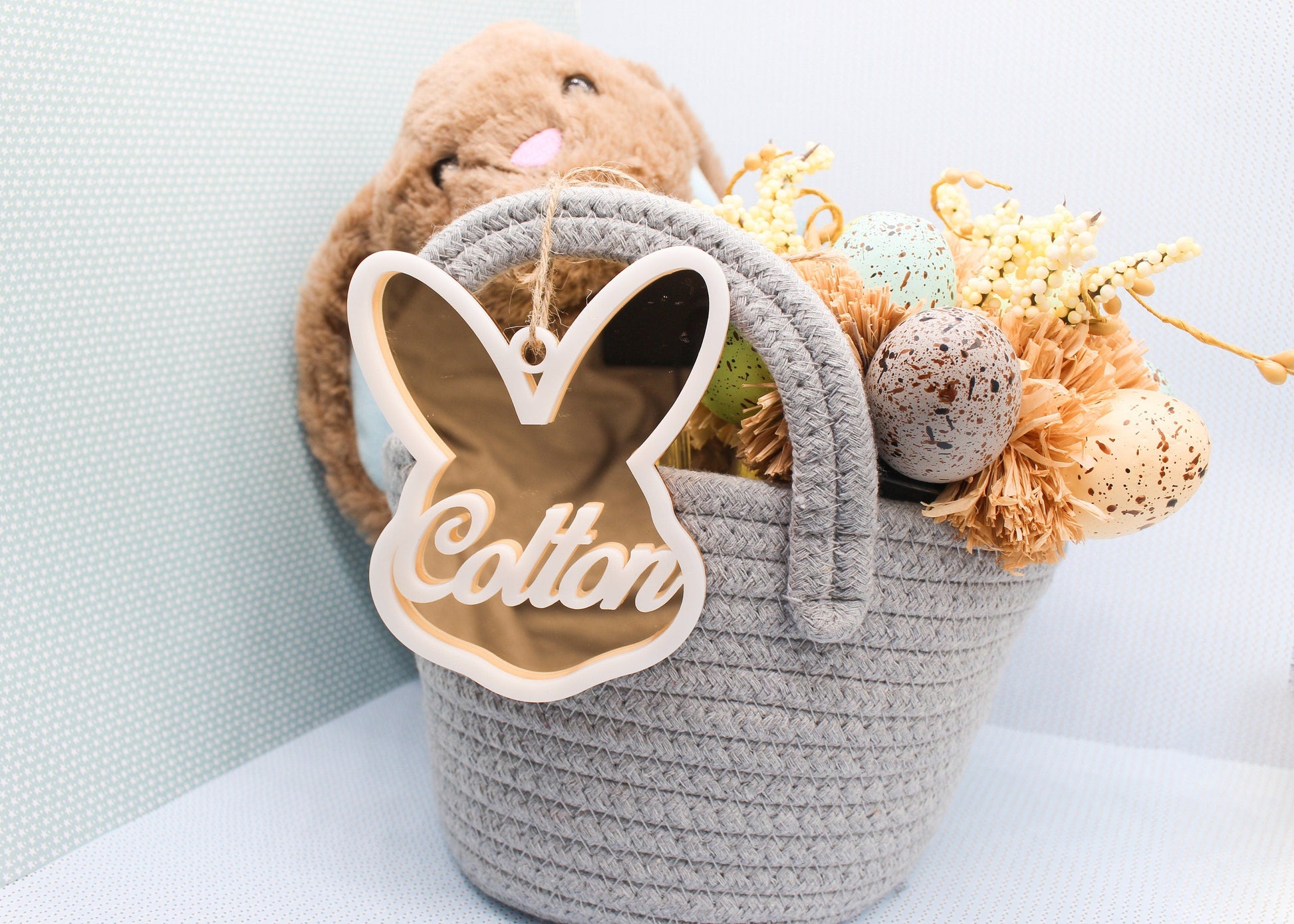 Add a cute accent piece to any Easter basket, bucket or bag with the Personalized Acrylic Easter Basket Tag. Featuring a festive 3D laser cut design, this tag can easily be attached to any basket or used as home decor.
