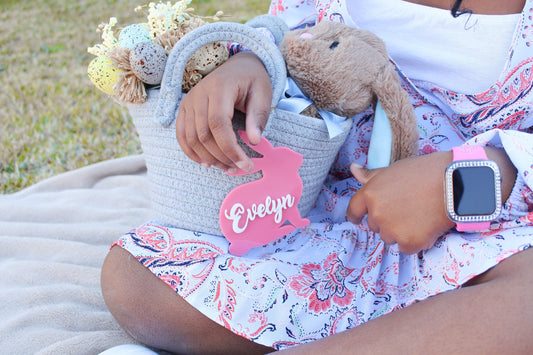 pink Custom 3D Name Bunny Tag attached to a pink grey easter basket.